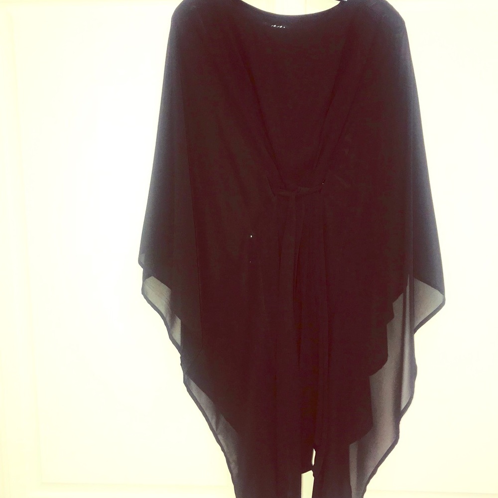 Black dress with butterfly sleeves.